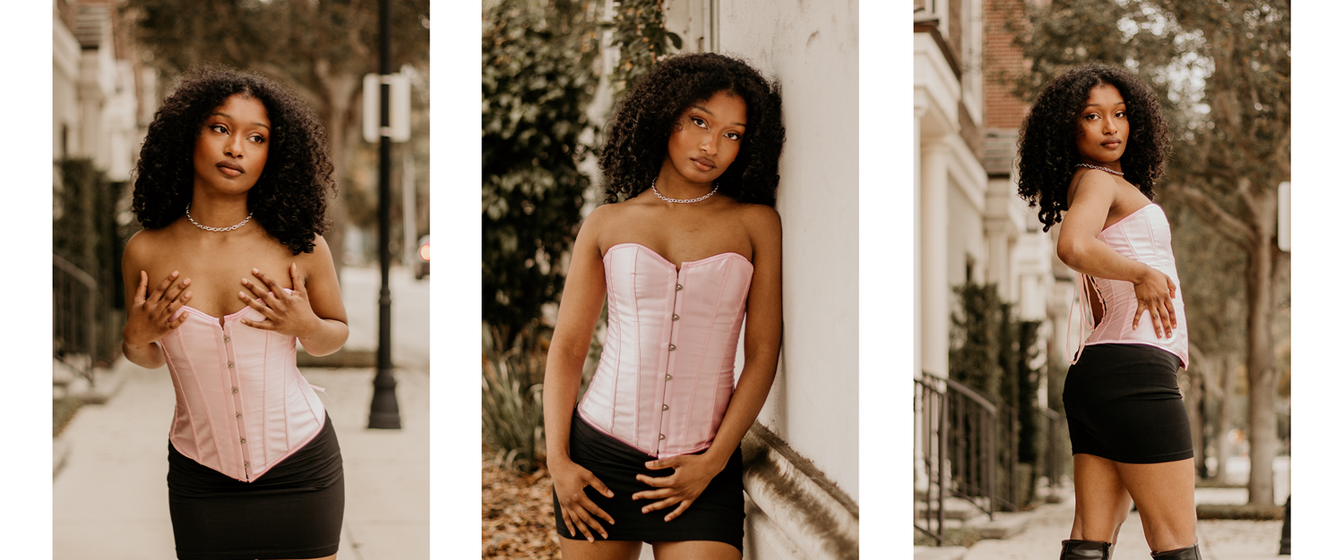 Femme portant un corset bustier rose