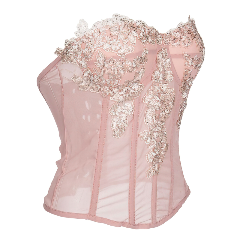 Zoom sur un bustier corset rose pâle vu de profil